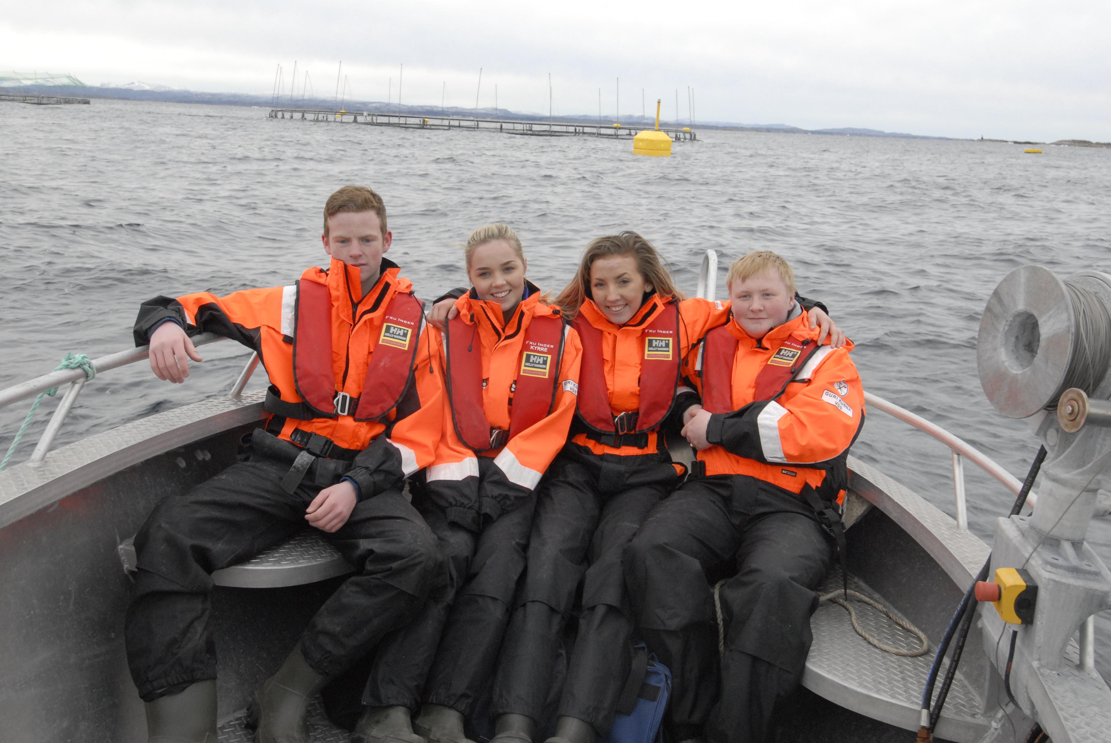 Students are visiting a fish farm